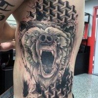 Cool painted black and white roaring bear tattoo on side with ornaments