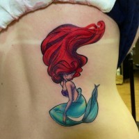 Cool painted cartoon like colored mermaid tattoo on back