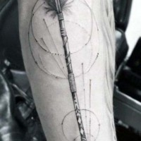 Cool painted very detailed black and white antic arrow tattoo on arm