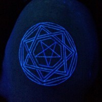 Cool simple designed glowing ink cult star tattoo