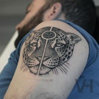 Cool symmetrical painted shoulder tattoo of leopard head with original sign