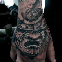 Cool wooden like colored mystical samurai mask tattoo on hand