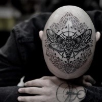 Creative blackwork style head tattoo of big fly