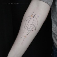 Creative circle shaped colored forearm tattoo of geometrical figure