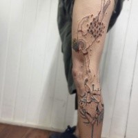 Creative painted colored whole leg tattoo of strange looking couple