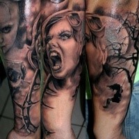 Creepy looking colored arm tattoo of screaming woman with dark tree
