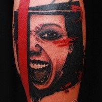Creepy looking colored leg tattoo of screaming woman face