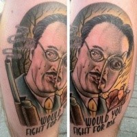 Creepy looking colored man portrait with lettering tattoo on leg