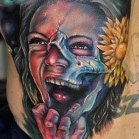 Creepy looking colored modern style horror woman portrait tattoo with yellow flower