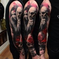 Creepy looking colored shoulder tattoo of woman with bone mask and fog
