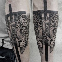 Creepy looking designed by Valentin Hirsch split tattoo of leopard head with human heart