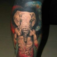 Creepy painted demonic half elephant half man tattoo on leg