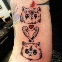 Creepy surrealism style colored arm tattoo of strange looking cat