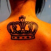 Crown tattoo on the back for elegant women