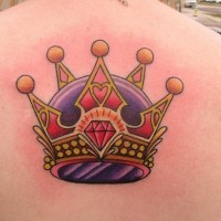 Crown tattoo on the back for women