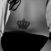 Crown tattoo on the back for women