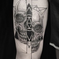 Cult style big black ink fragmented skull with mystic pyramid tattoo on thigh