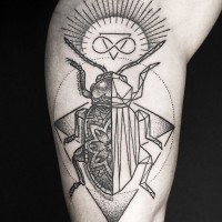 Cult style big black ink mystical tattoo with insect on arm