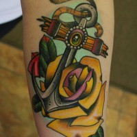 Cute big old school anchor with yellow rose tattoo on forearm