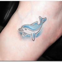 Cute blue dolphin tattoo on foot