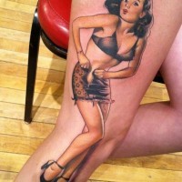 Cute cartoon like painted seductive woman tattoo on thigh
