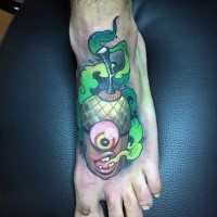 Cute cartoon style colored monster acorn tattoo on foot