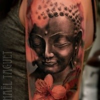 Cute colored shoulder tattoo of Buddha statue with lotus flowers