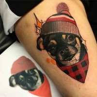 Cute colored thigh tattoo of little dog with hat