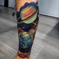 Cute creative painted colored leg tattoo of solar system planets
