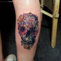 Cute floral skull tattoo on leg