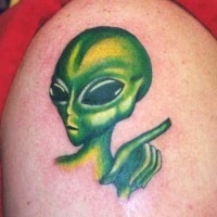 Cute green alien tattoo