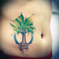 Cute little colored lonely tree with lettering tattoo on side