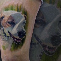 Cute little colorful dog portrait tattoo