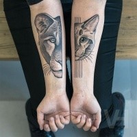 Cute looking black ink Valentin Hirsch tattoo of big lion and cat head