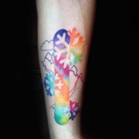 Cute looking colored forearm tattoo of snowboard with snowflake
