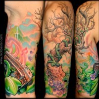 Cute looking colored shoulder tattoo of lonely tree and nice harmonic