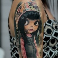 Cute looking colored shoulder tattoo of funny girl