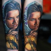 Cute looking realistic woman face tattoo on forearm with old golden clock