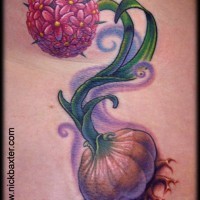 Cute natural looking colored small plant tattoo on side