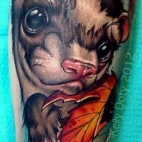 Cute natural looking sad animal portrait tattoo with maple leaf