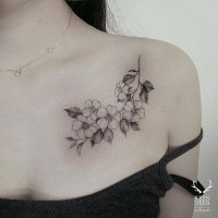 Cute nice looking chest tattoo of beautiful flowers by Zihwa