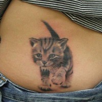 Cute realistic walking kitten tattoo