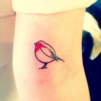 Cute red small bird tattoo on arm for lady
