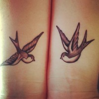 Cute swallow bird tattoo on different hands