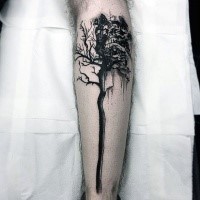 Dark black ink leg tattoo of big tree and sun