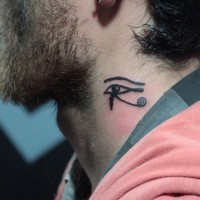 Dark black ink stylized ancient Egyptian symbol the Eye of Horus neck tattoo