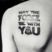Dark black ink thick Star Wars quote lettering tattoo on shoulder with Darth Vader's helmet