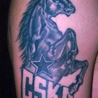 Dark horse emblem tattoo on arm