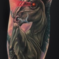 Dark horse head with glowing eyes tattoo
