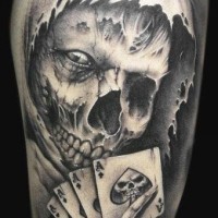 Death and playing cards tattoo